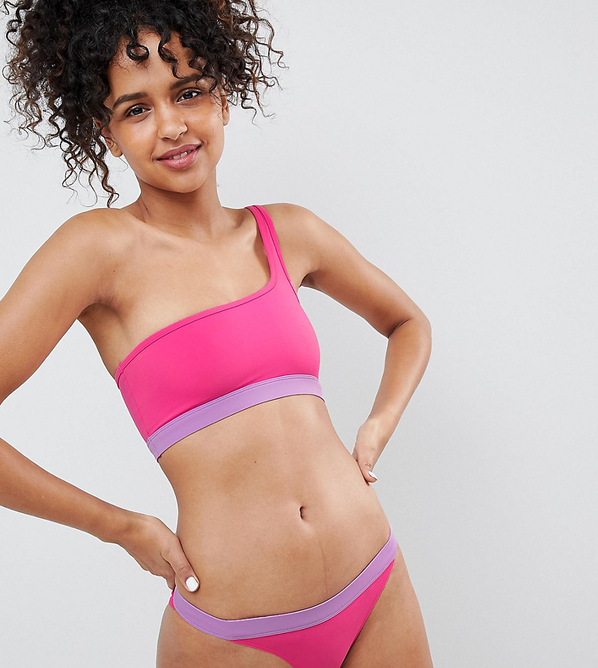 Imagen principal de producto de Braguitas de bikini tipo tanga en rosa con diseño en contraste de Monki - Monki