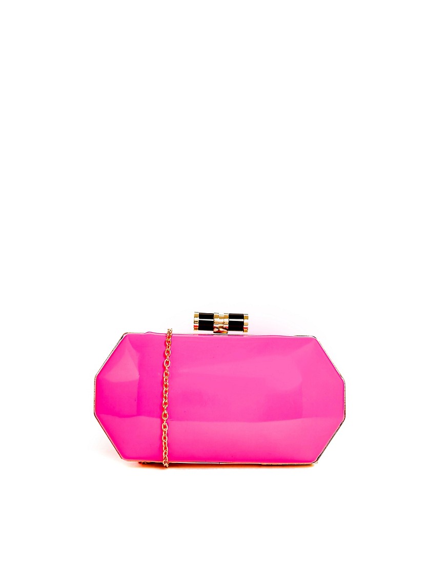 Pink | Liquorish Hard Shell Neon Pink Clutch Bag at ASOS
