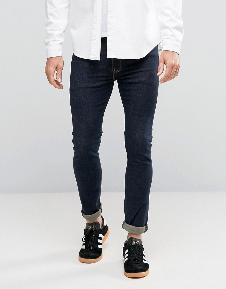 Зауженные джинсы цвета индиго с контрастными строчками Levis 519