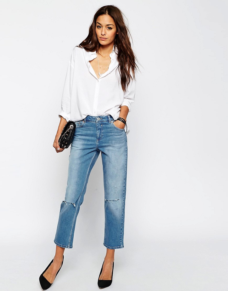 Image 1 of ASOS Thea Midrise Girlfriend Jeans in Miami Vintage Blue with Displaced Knee Rips