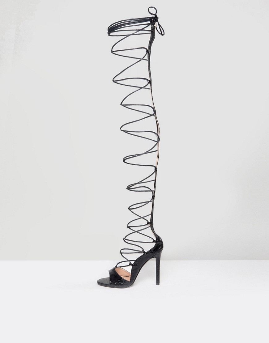 Imagen principal de producto de Botas negras a la rodilla con cordones Kiss de Public Desire - Public Desire
