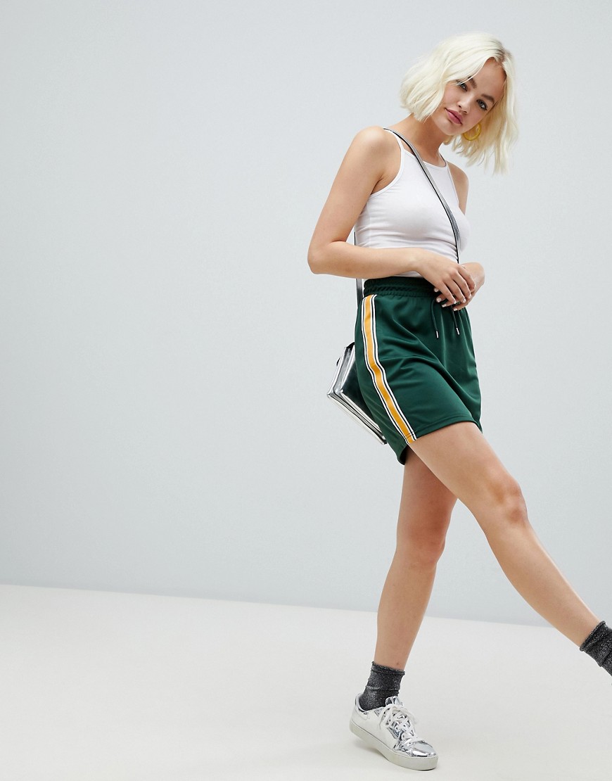Imagen principal de producto de Minifalda de conjunto con raya lateral en verde oscuro de Monki - Monki