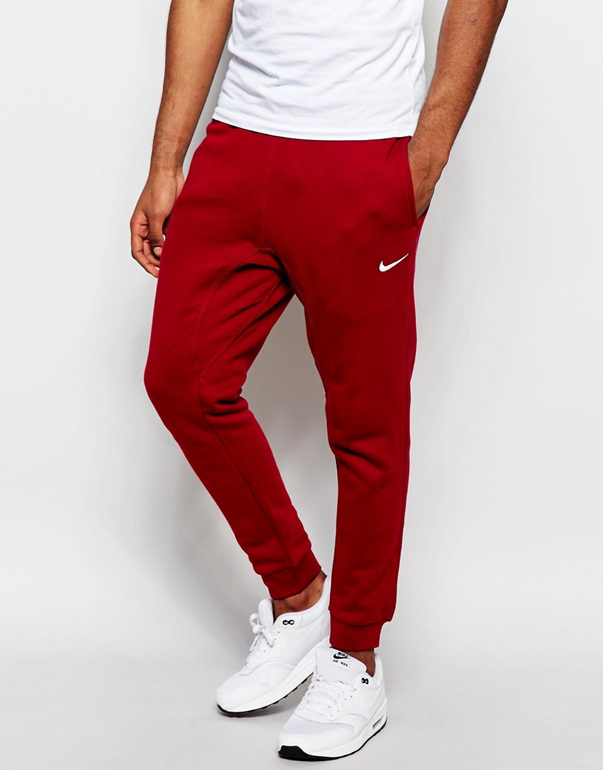red mens nike joggers