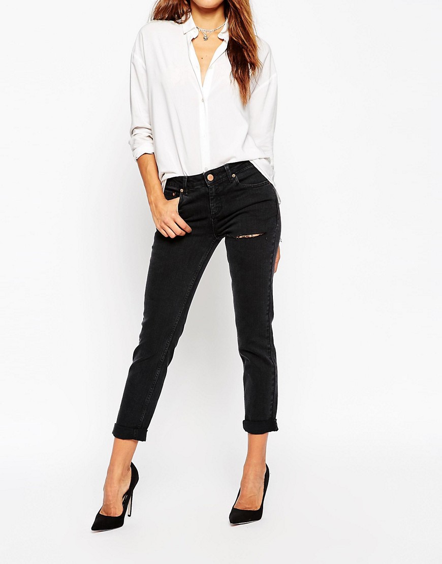 Image 1 of ASOS Kimmi Shrunken Boyfriend Jeans in Washed Black with Thigh Rip