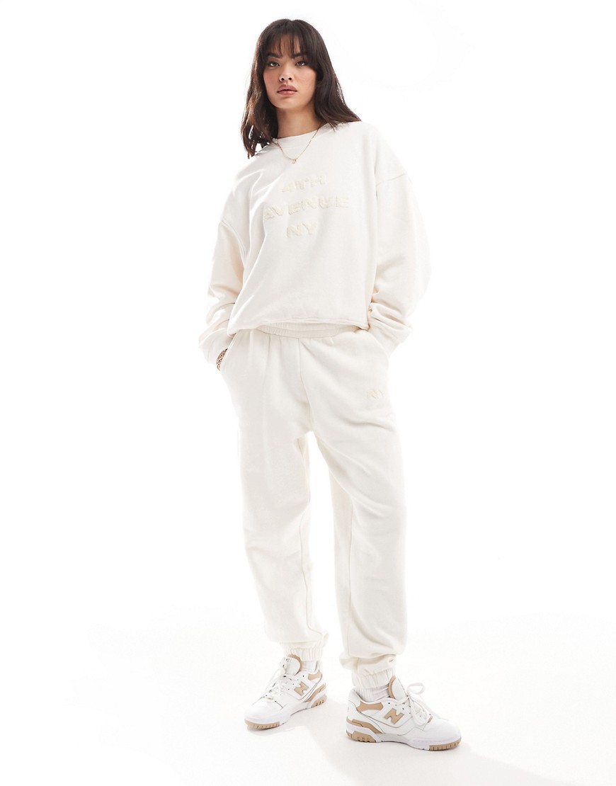 4th & Reckless embossed boucle NY logo joggers co-ord in cream-White