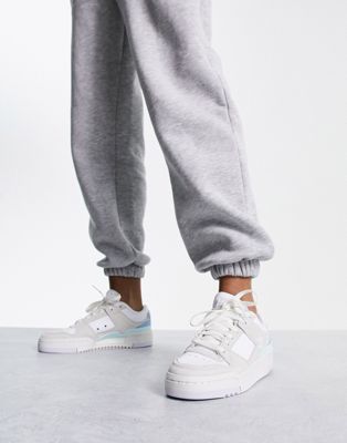 Forum Low Luxe trainers in off white with blue detail