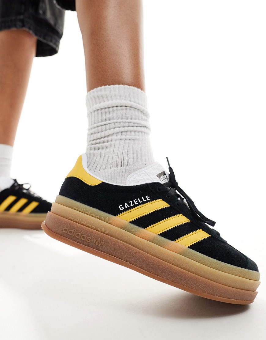 adidas Originals Gazelle Bold platform trainers in black and gold