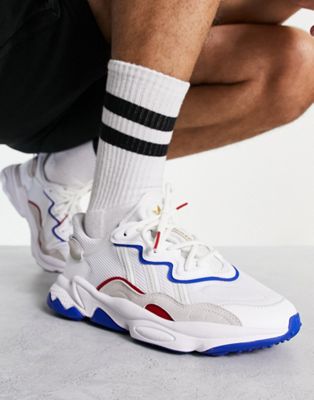 Ozweego trainers in white and blue