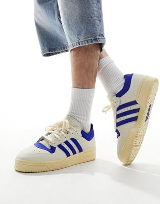 Rivalry Low trainers in white and blue