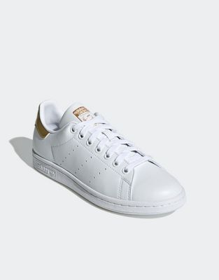 Stan Smith trainers in white/gold