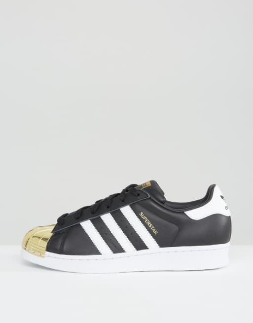 adidas nere punta oro adidas nere punta oro