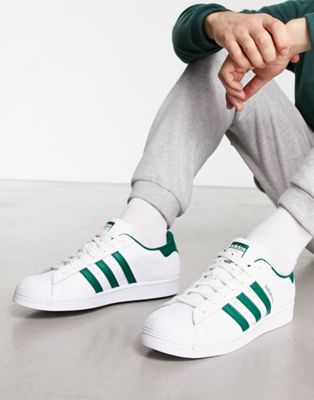 Superstar trainers in white and green