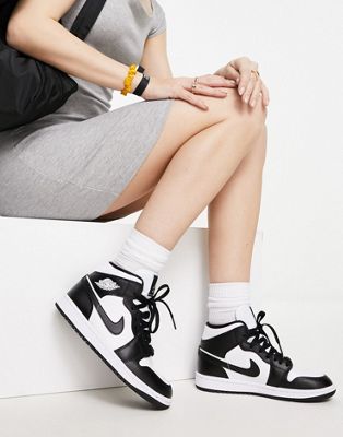 Air  1 Mid trainers in white and black