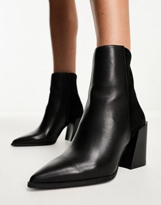 Coanad heeled ankle boots in black leather