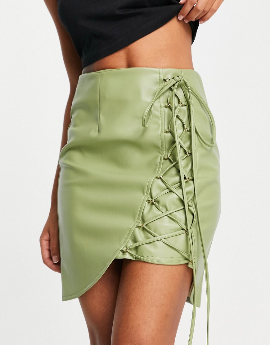 Amy Lynn lace up mini PU skirt in green