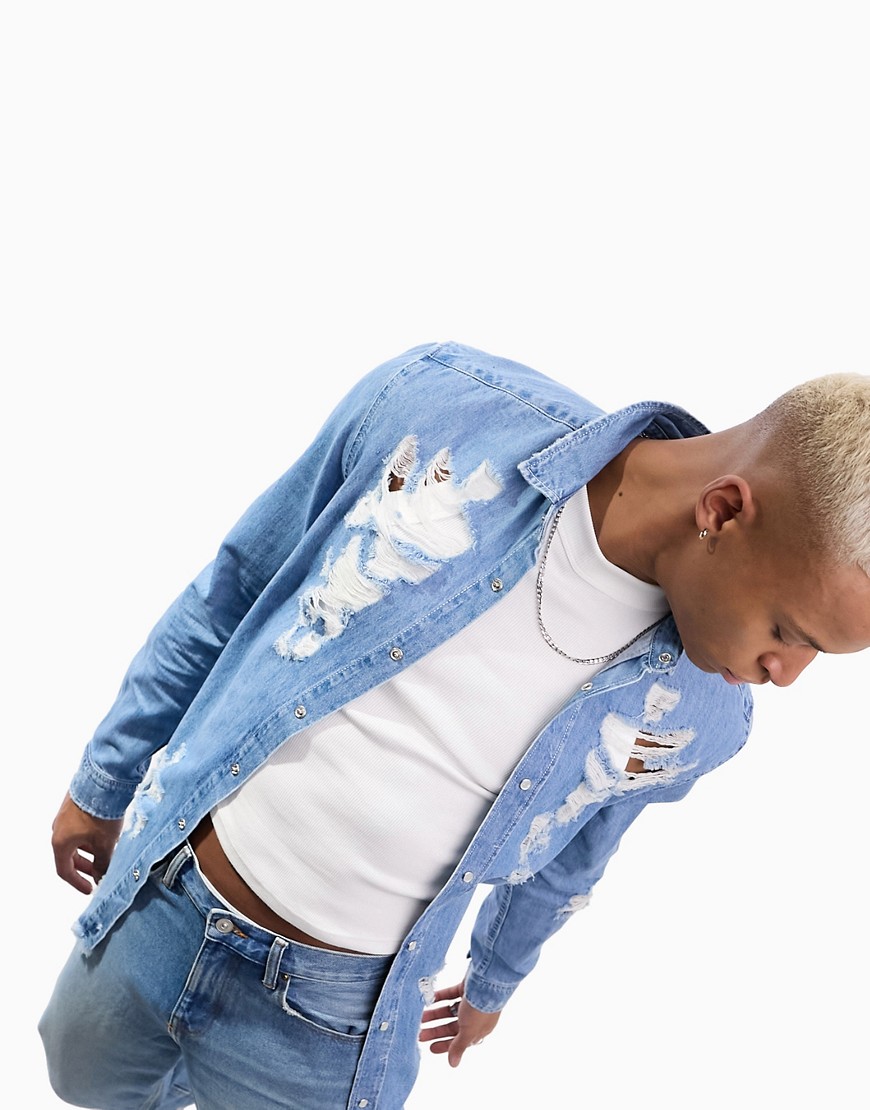 ASOS DESIGN 90s oversized denim shirt with extreme rips in blue