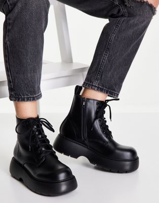 Alter lace up boots in black