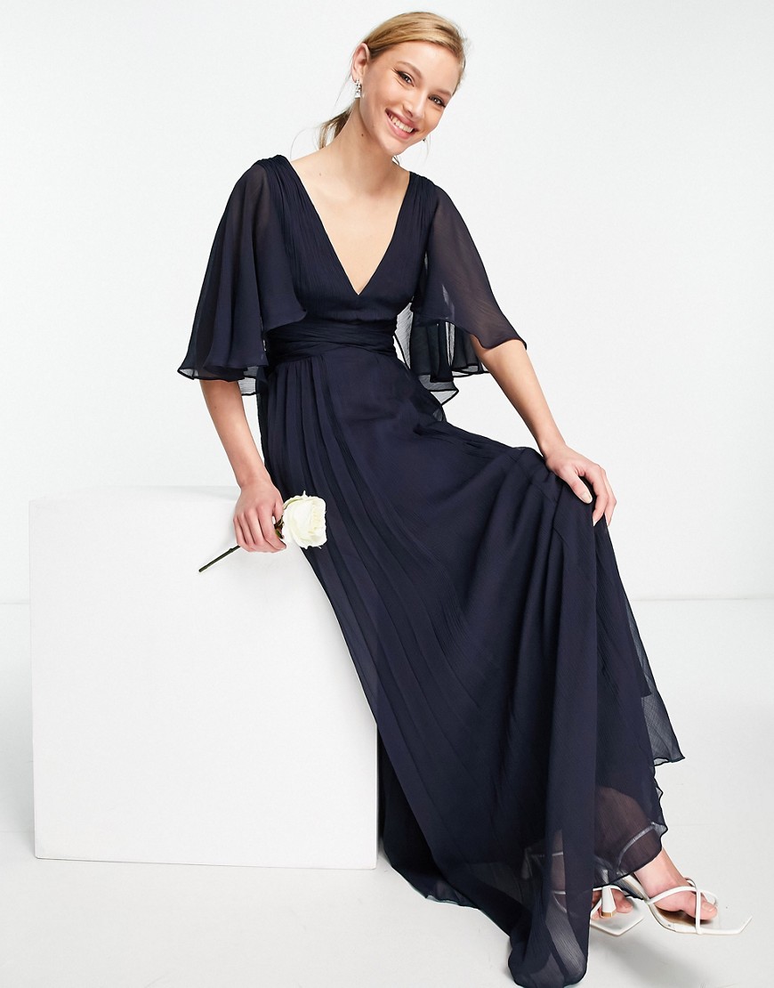 ASOS DESIGN Bridesmaid ruched bodice drape maxi dress with wrap waist and flutter cape sleeve-Navy