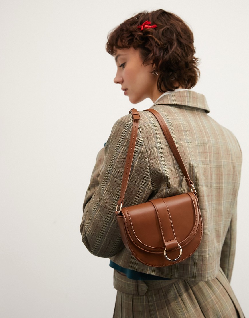ASOS DESIGN buckle detail saddle crossbody bag in tan-Brown