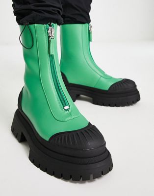 chelsea boot with zip front in green faux leather and black sole