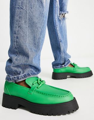 chunky loafers in green faux leather with chain detail and contrast sole