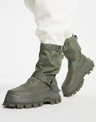 chunky sole boot in olive canvas with strap detail