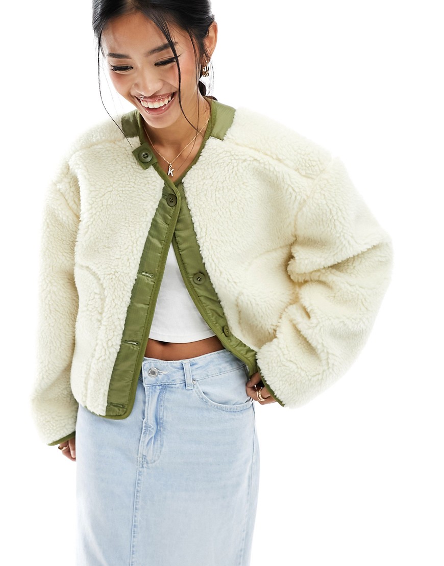 ASOS DESIGN collarless cropped borg fleece jacket in khaki with contrast lining-Green