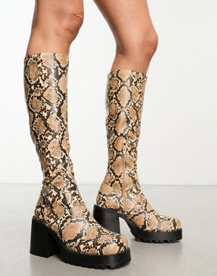 Command heeled knee boots in snake