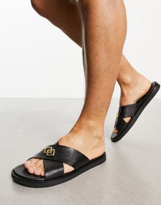 cross strap sandals in black saffiano leather with badge