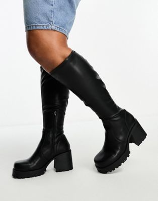 Curve Command heeled knee boots in black