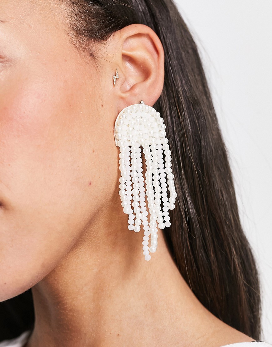 ASOS DESIGN drop earrings with pearl tassel design in cream-White
