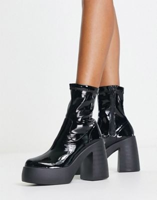 Ember high heeled sock boots in black patent