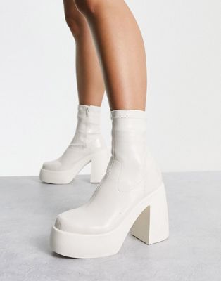 Ember high heeled sock boots in off white patent