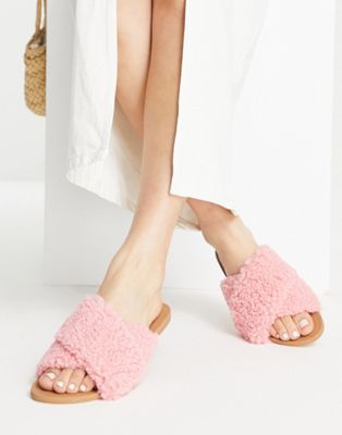 Flock padded flat mules in pink shearling