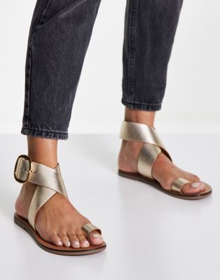 Flyer leather toe loop flat sandals in gold