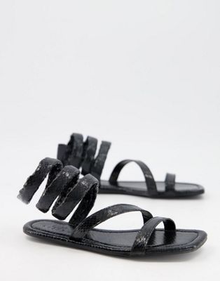 Forcefield flat sandals in black snake