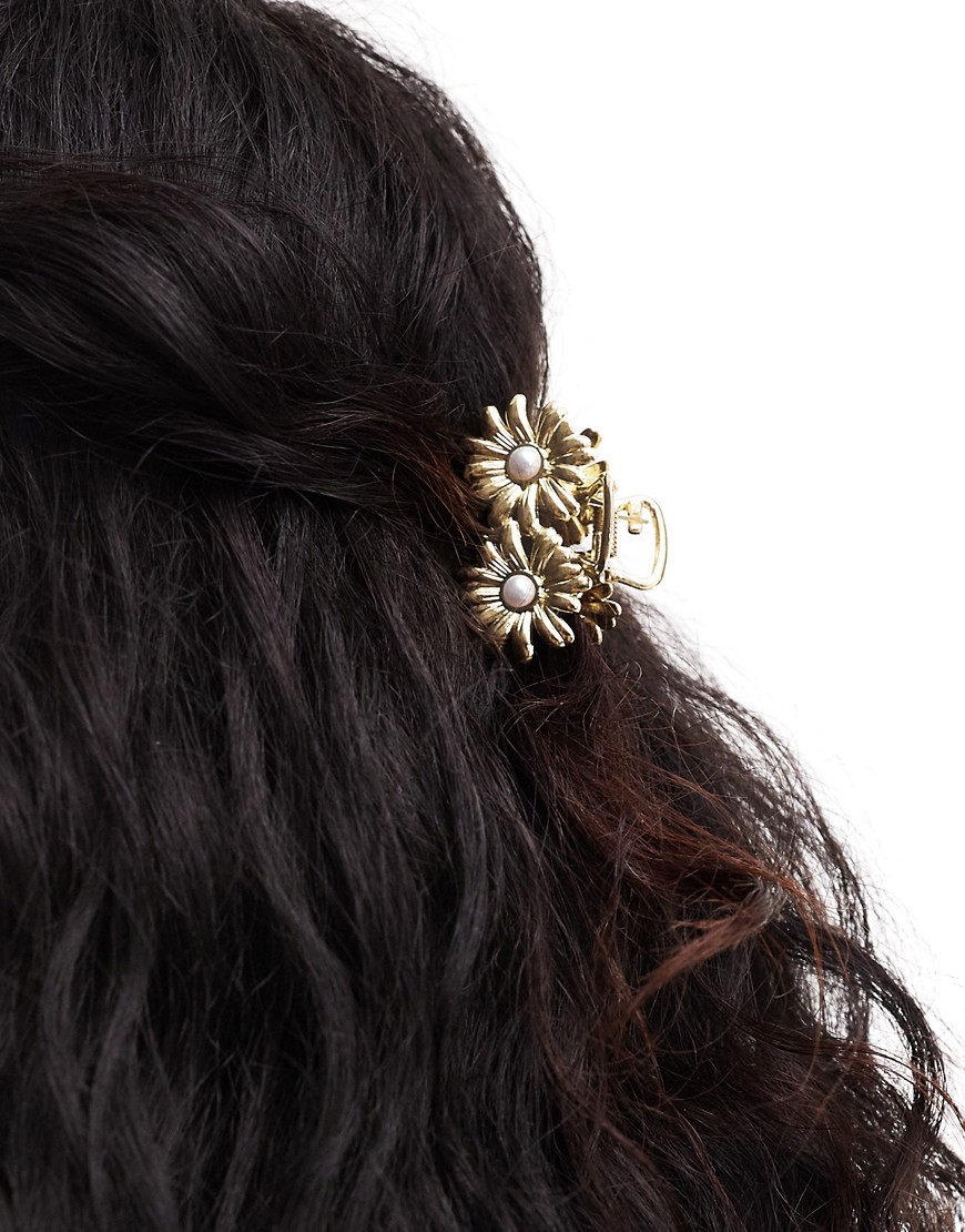 ASOS DESIGN hair clip claw with daisy and faux pearl design in gold tone