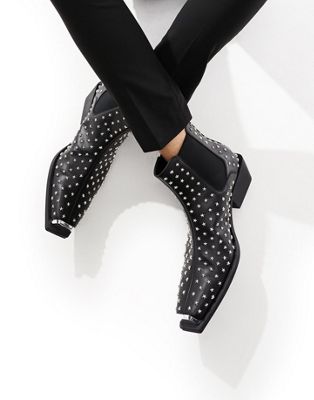 heeled chelsea boot in black with all over star studs