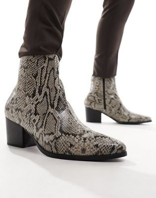 heeled chelsea boots in snake print faux leather