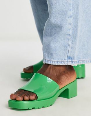 heeled jelly mules in green