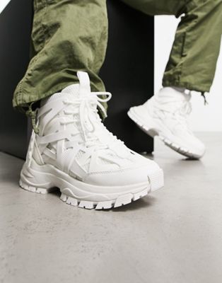 high top trainers with rubber panels and chunky sole in white