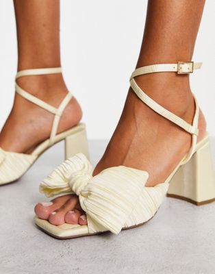 Hitched bow detail mid block heeled sandals in ivory