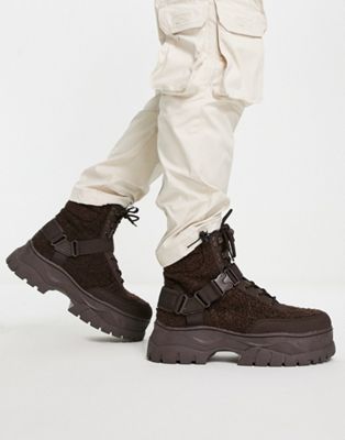 lace up boot in brown borg with strap detail on chunky sole