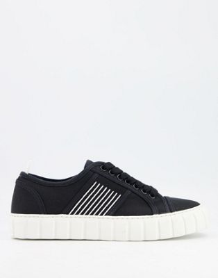 lace up plimsolls in black with ribbed sole