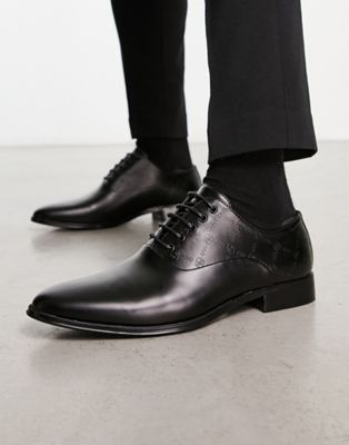 lace up shoes with emboss design in black faux leather
