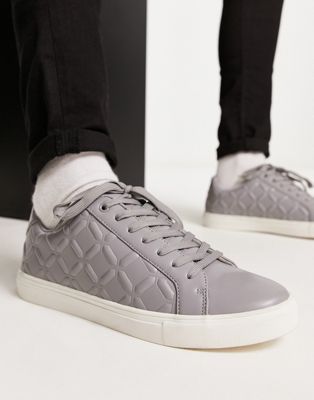 lace up trainers in grey with embossed panels