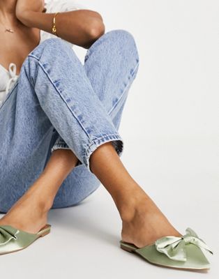 Lass oversized bow pointed flat mules in sage green satin