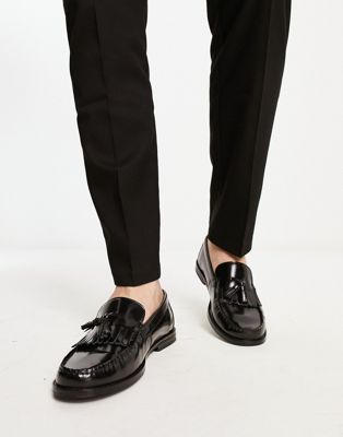 loafers with fringe detail in polished black leather