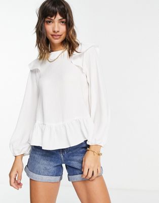 Long sleeve top with ruffle detail in ivory