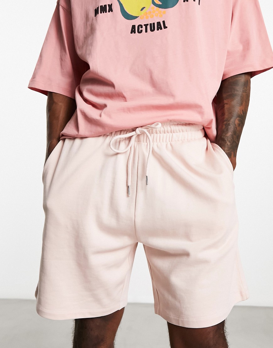 ASOS DESIGN oversized jersey mid length shorts in pink